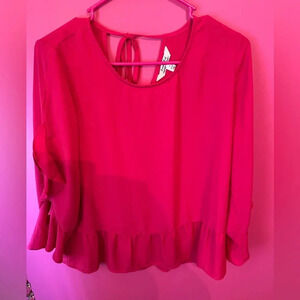 Pink blouse with ruffles